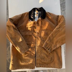 Vintage Carhartt brown jacket in men’s size XL with a warm wool-lined interior.